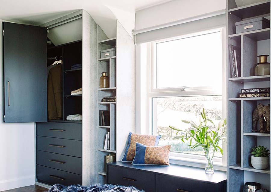 boot room with bifold door open