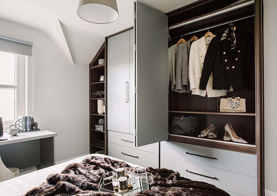 green bifold unit opened showing clothing
