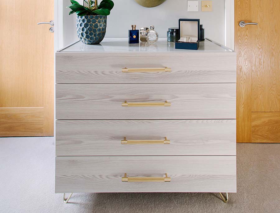 beside unit with gold handles