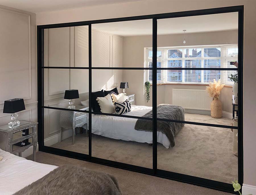 black framed mirrored sliding wardrobe