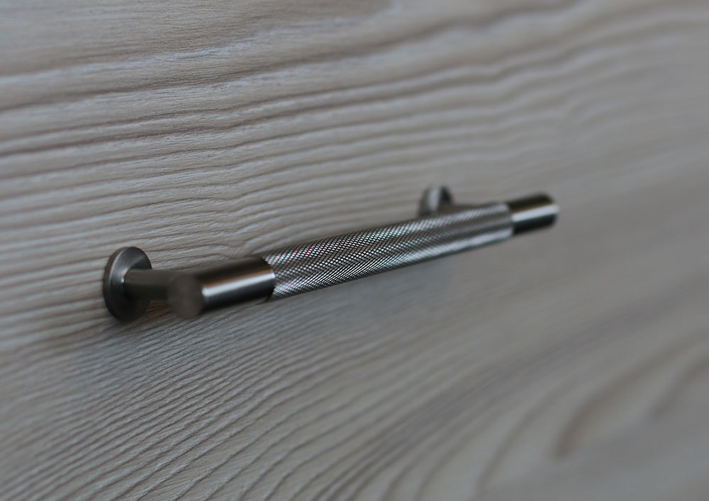 close up of knurled chrome handle
