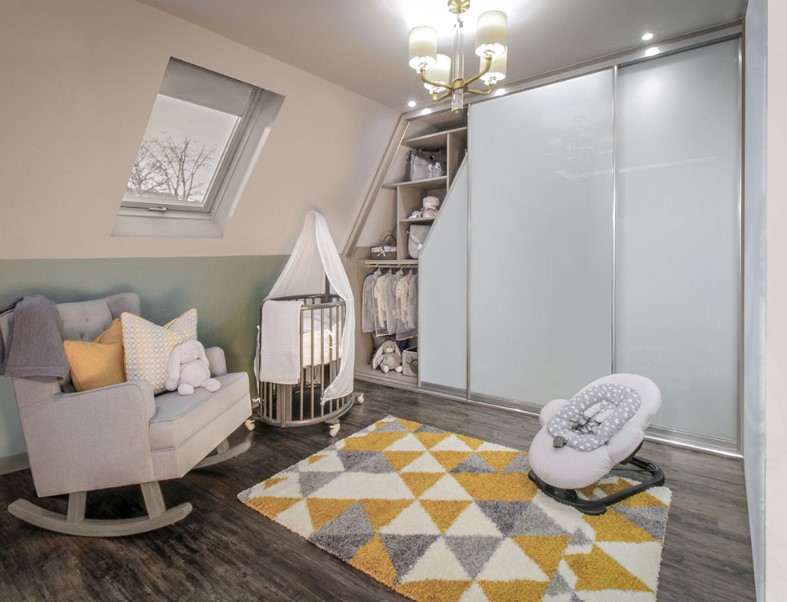 baby room with angled sliding wardrobe