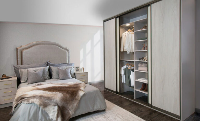 woodgrain sliding wardrobe with bed in background