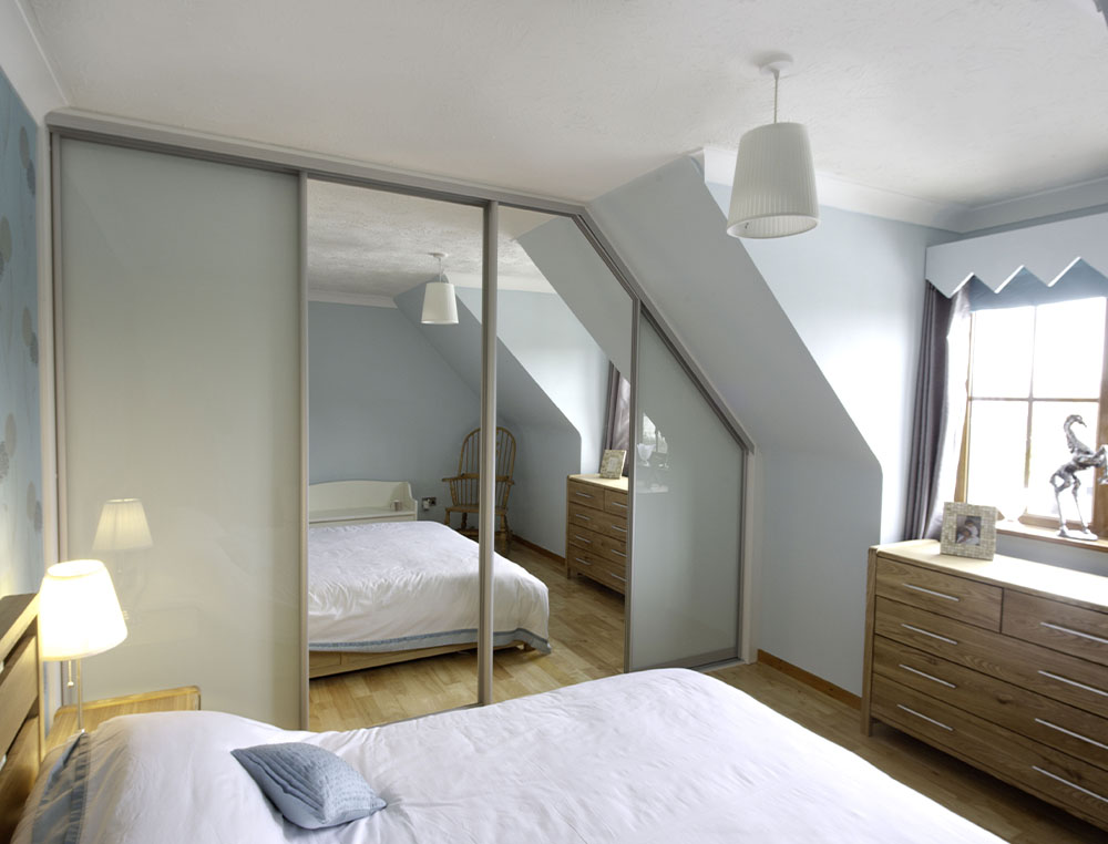 angled glass and mirrored sliding wardrobe